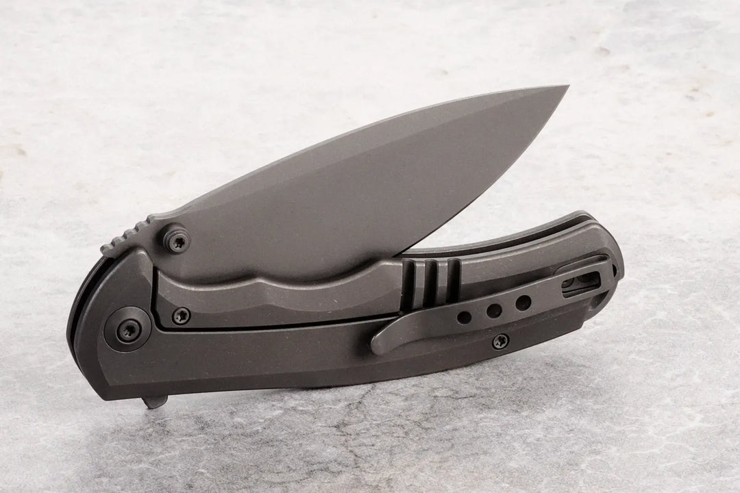 Kaviso Exclusive WE Knife Praxis with S35VN Blade, Titanium Frame Lock, Stonewashed Blade, Dual thumbstuds