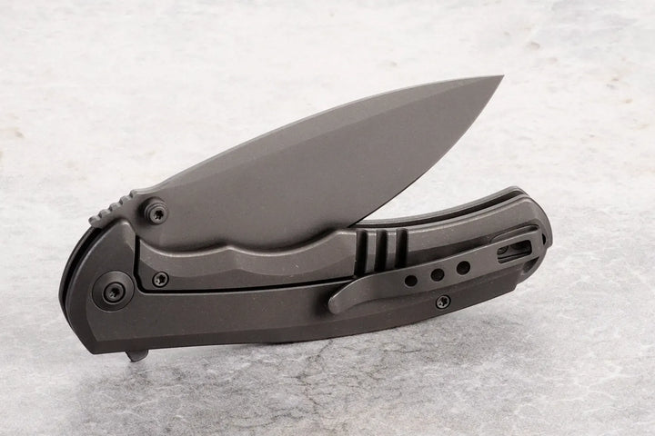 Kaviso Exclusive WE Knife Praxis with S35VN Blade, Titanium Frame Lock, Stonewashed Blade, Dual thumbstuds