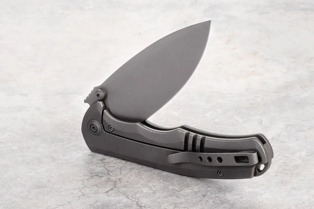Kaviso Exclusive WE Knife Praxis with S35VN Blade, Titanium Frame Lock, Stonewashed Blade, Dual thumbstuds