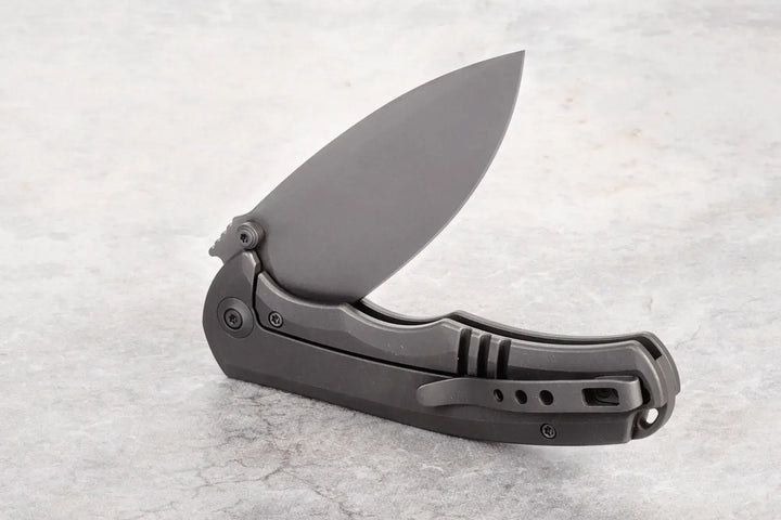 Kaviso Exclusive WE Knife Praxis with S35VN Blade, Titanium Frame Lock, Stonewashed Blade, Dual thumbstuds
