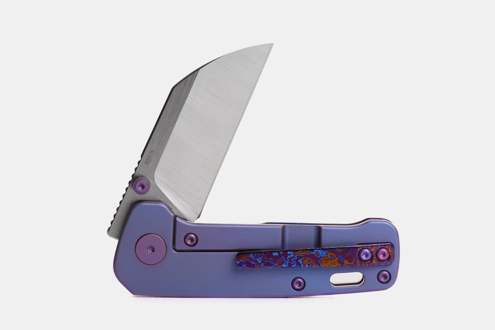 Kaviso x QSP Penguin Mini with full Mokuti show side and clip. Clip-side handle is purple anodized titanium with S35VN Satin blade and purple Ti hardware accents