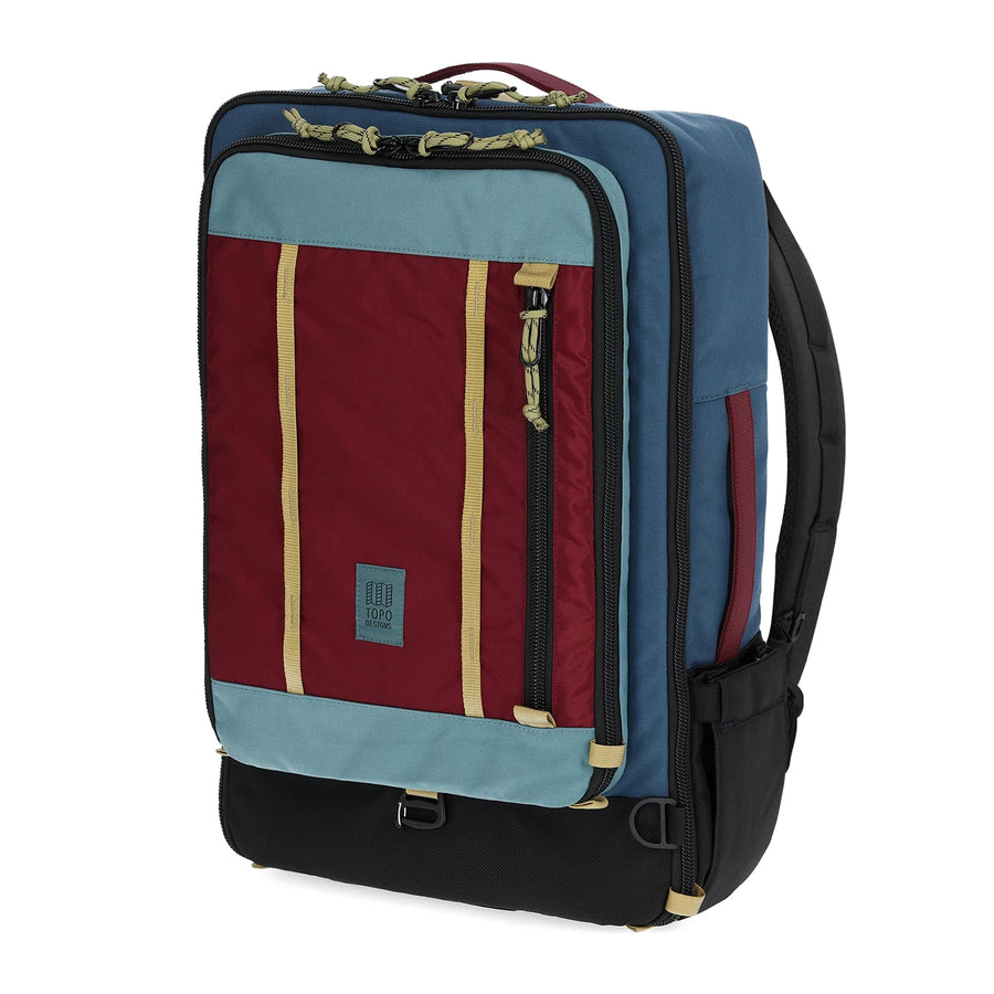 Topo Designs Global Travel Bag 40L in Dark Denim / Burgundy - front view of bag made with recycled materials) offers 3-way carry options