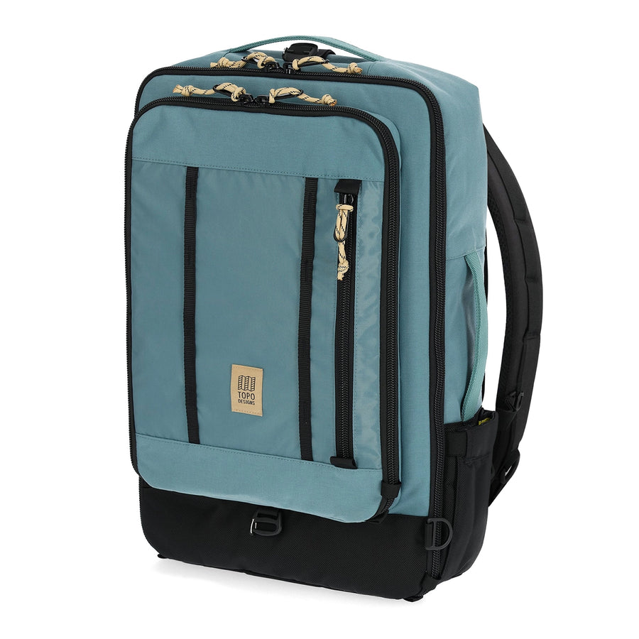 Topo Designs Global Travel Bag 40L in Sea Pine - front view of bag made with recycled materials) offers 3-way carry options