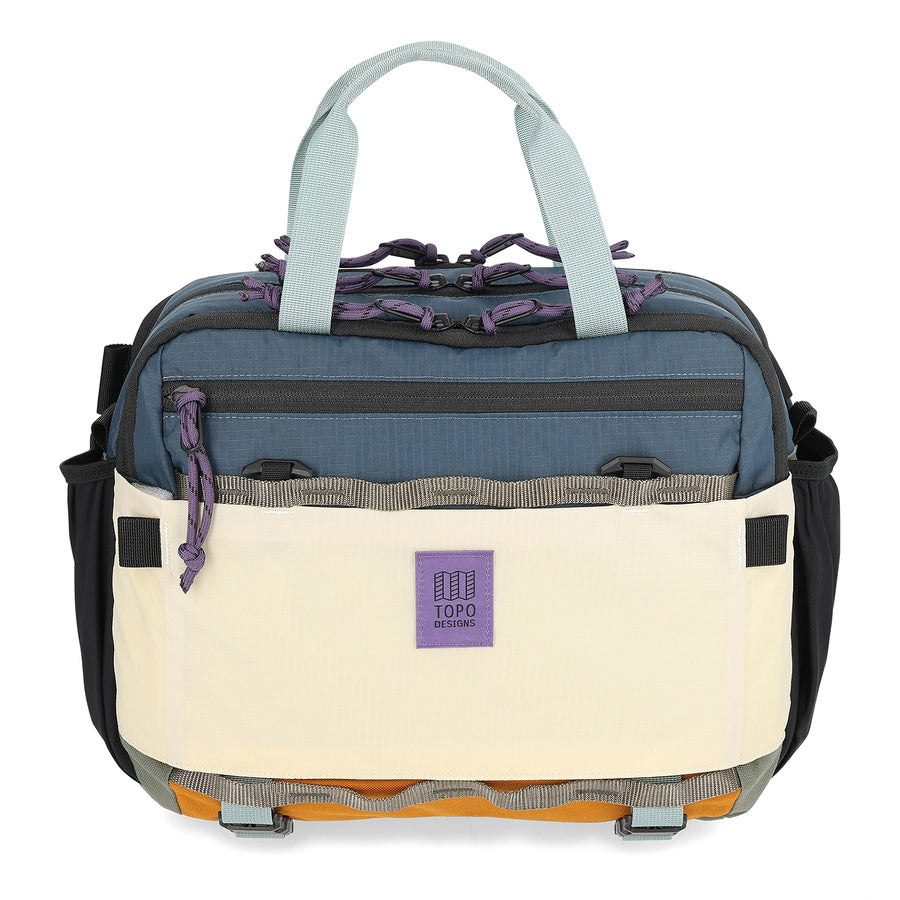 Topo Designs Mountain Cross Bag in Pond Blue / Spice - front view of crossbody bag made with 1000D nylon lower panels