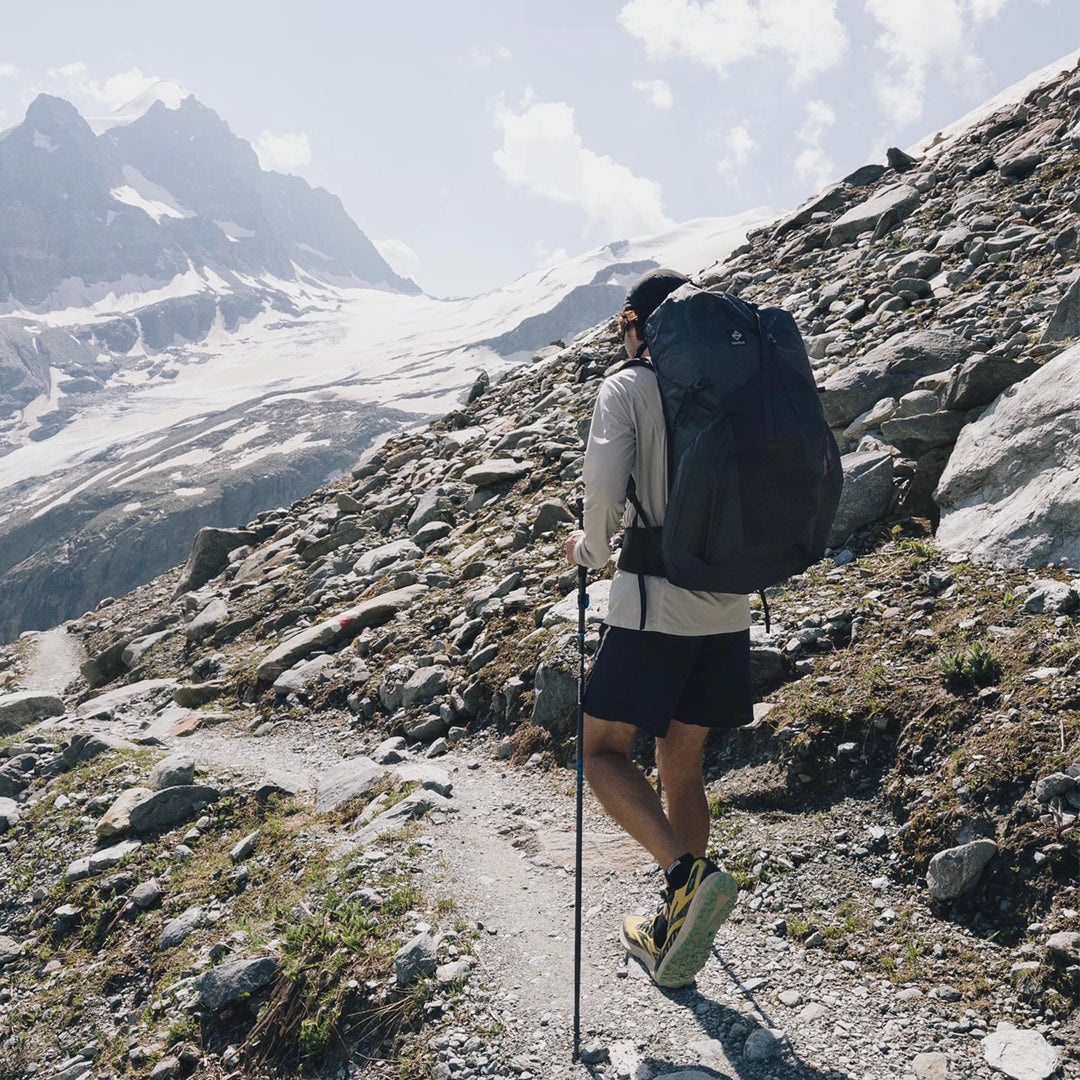 Bonfus Aerus 55L ultralight pack outdoor action shot - DCF Dyneema backpack in wilderness setting