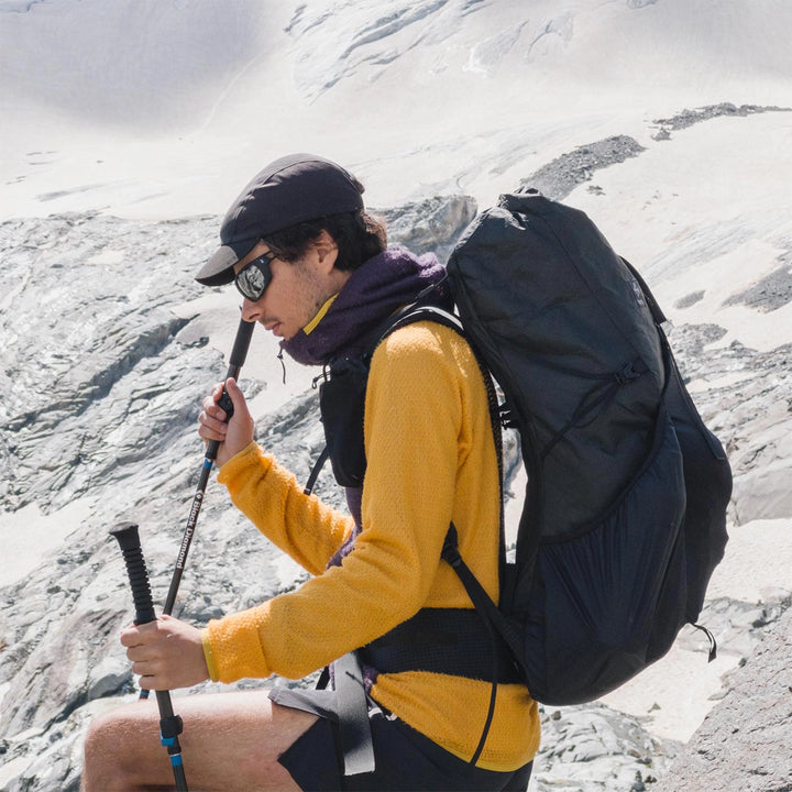 Bonfus Aerus 55L ultralight backpack lifestyle photo - hiker with DCF pack on outdoor trail