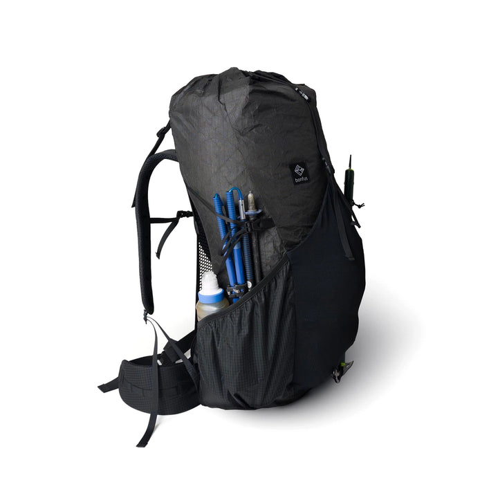 Bonfus Aerus 55L ultralight pack black side view - compression cords and side pockets on DCF backpack