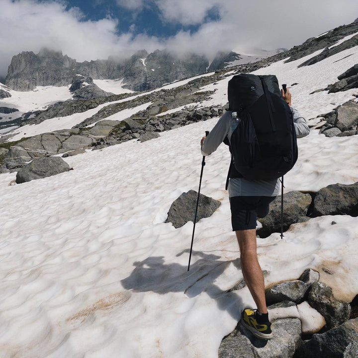 Bonfus Aerus 55L ultralight backpack outdoor adventure - DCF Dyneema pack on scenic mountain trail