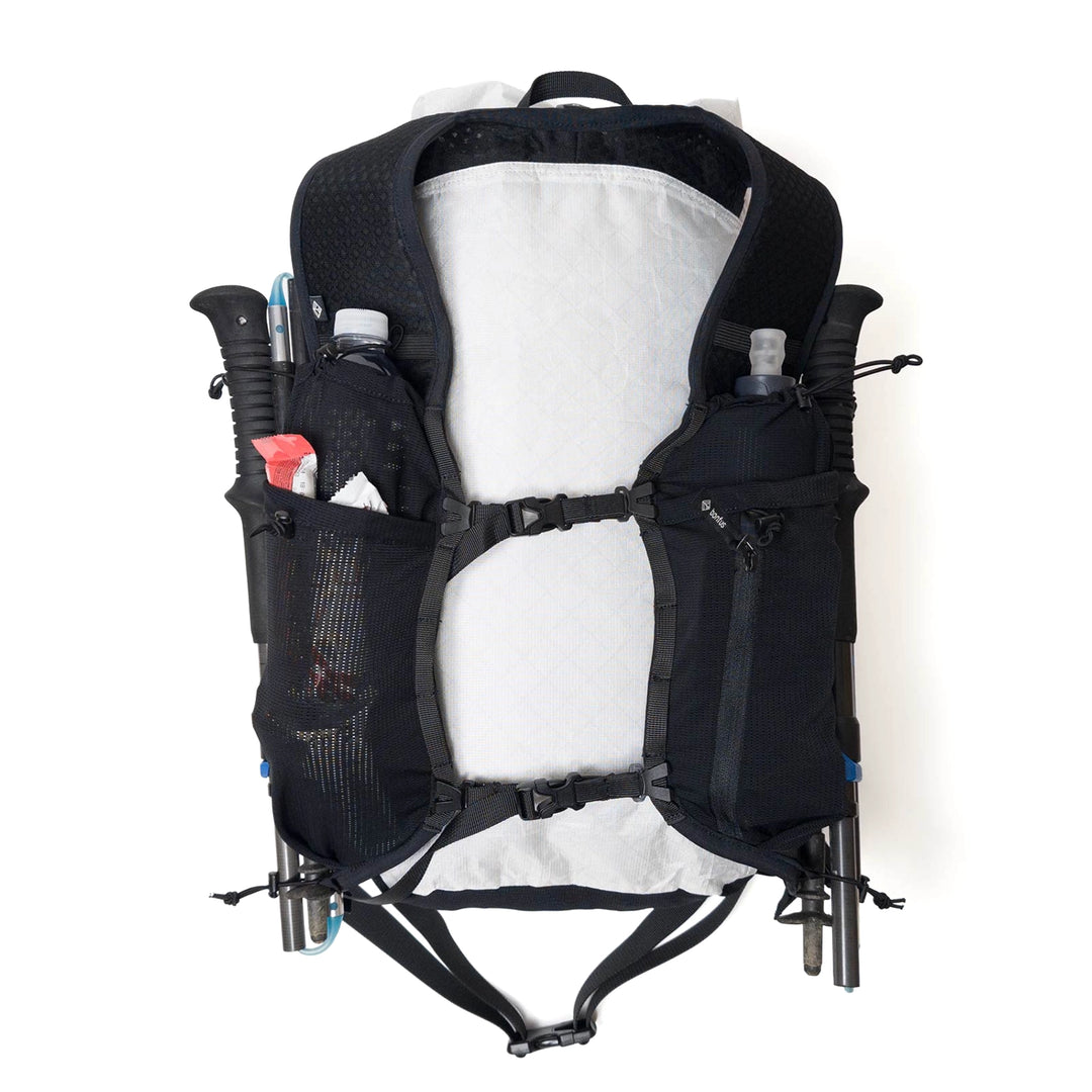 Bonfus Fastus 23L white back view with gear - loaded ultralight DCF fastpacker showing capacity