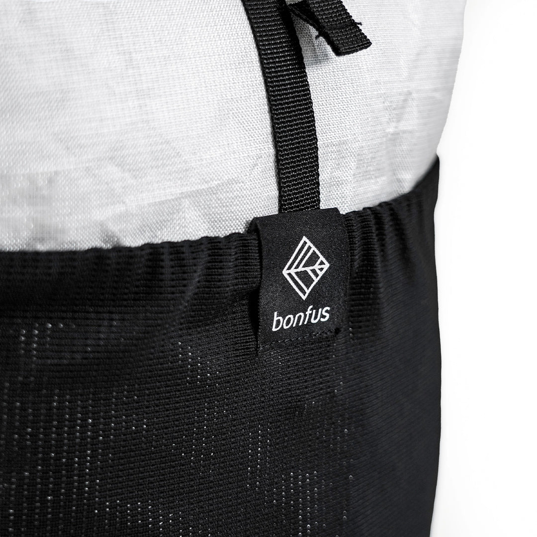 Bonfus Fastus 23L ultralight fastpacker white interior - roll top closure and main compartment