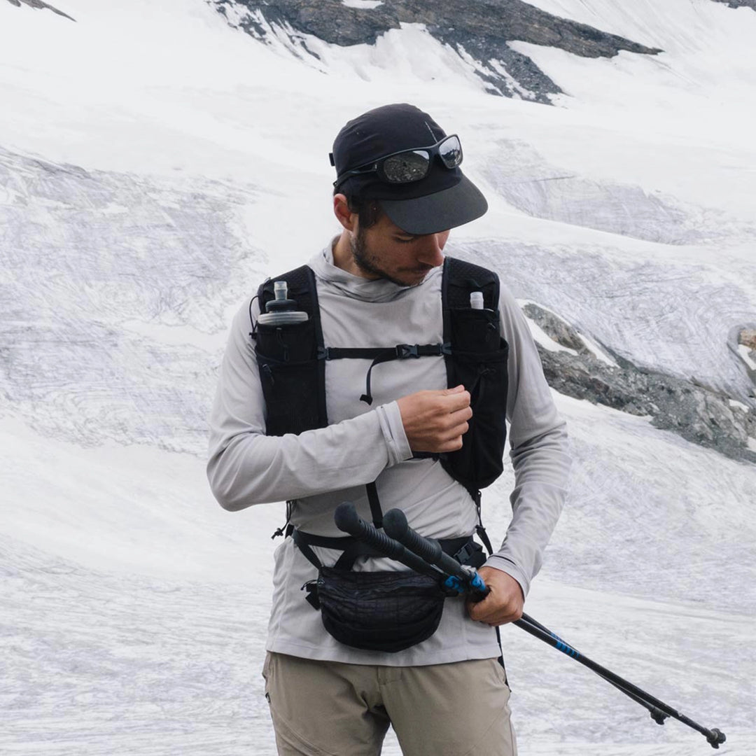 Bonfus Fastus 23L ultralight fastpacker action shot - runner with compact DCF daypack