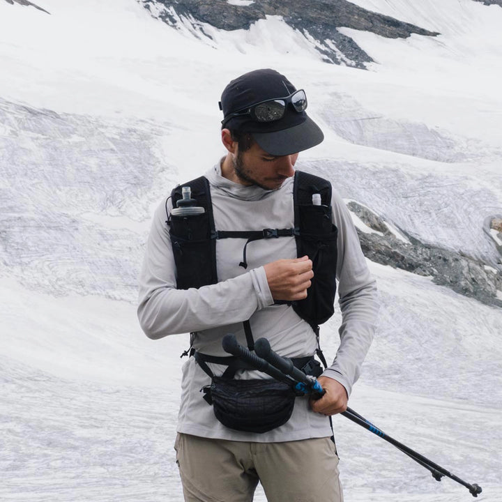 Bonfus Fastus 23L ultralight fastpacker action shot - runner with compact DCF daypack