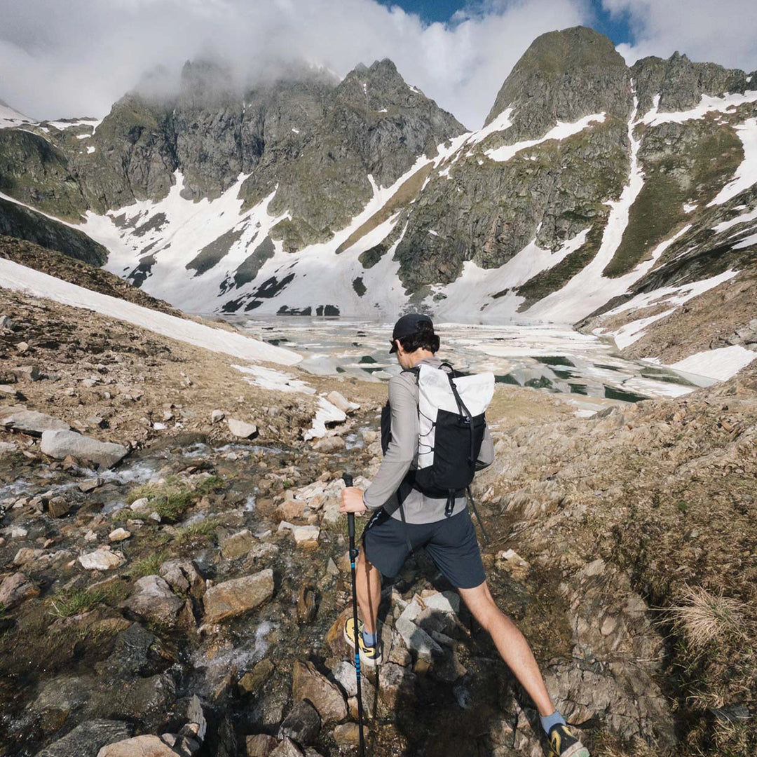 Bonfus Fastus 23L ultralight fastpacker lifestyle photo - compact DCF pack for trail running and fast hiking