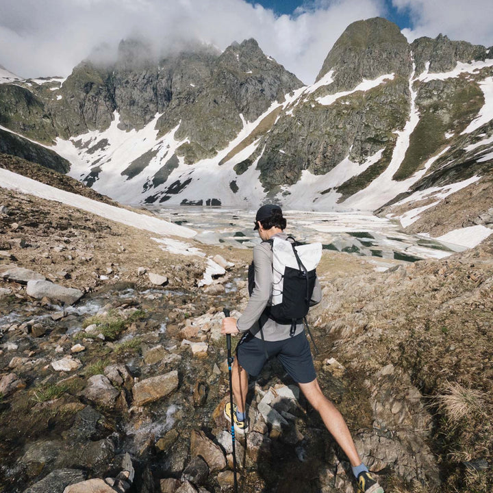 Bonfus Fastus 23L ultralight fastpacker lifestyle photo - compact DCF pack for trail running and fast hiking