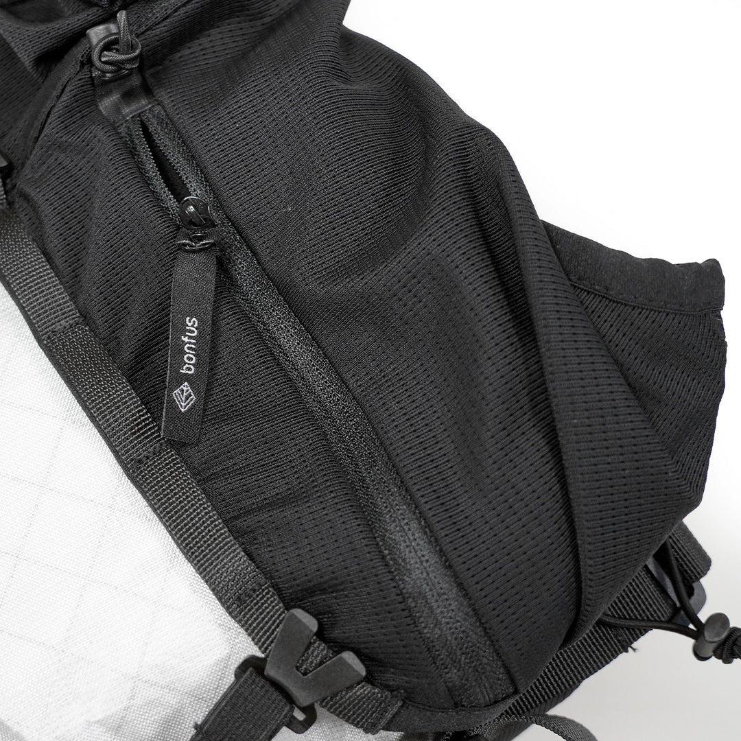 Bonfus Fastus 23L ultralight fastpacker white compression detail - minimalist DCF pack design
