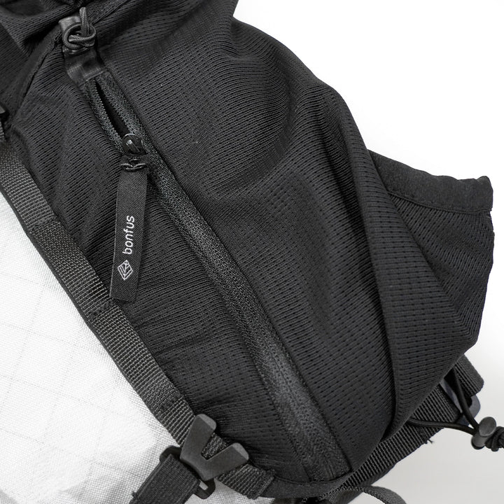 Bonfus Fastus 23L ultralight fastpacker white compression detail - minimalist DCF pack design