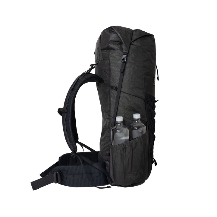 Bonfus Framus 58L ultralight pack black side view - side pockets and compression system on DCF hiking pack
