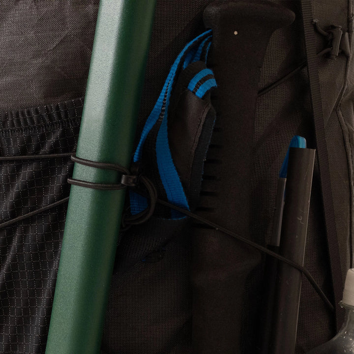 Bonfus Framus 58L ice axe attachment detail - secure loop for mountaineering gear on DCF ultralight backpack