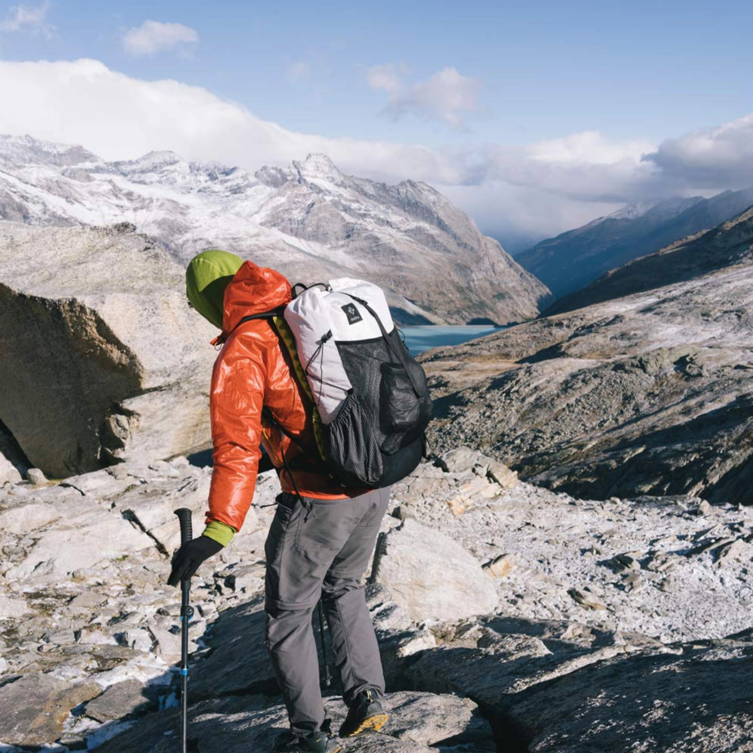 Bonfus Iterus 38L ultralight pack side view showing compression cords and durable side pocket - Ultra 200X fabric