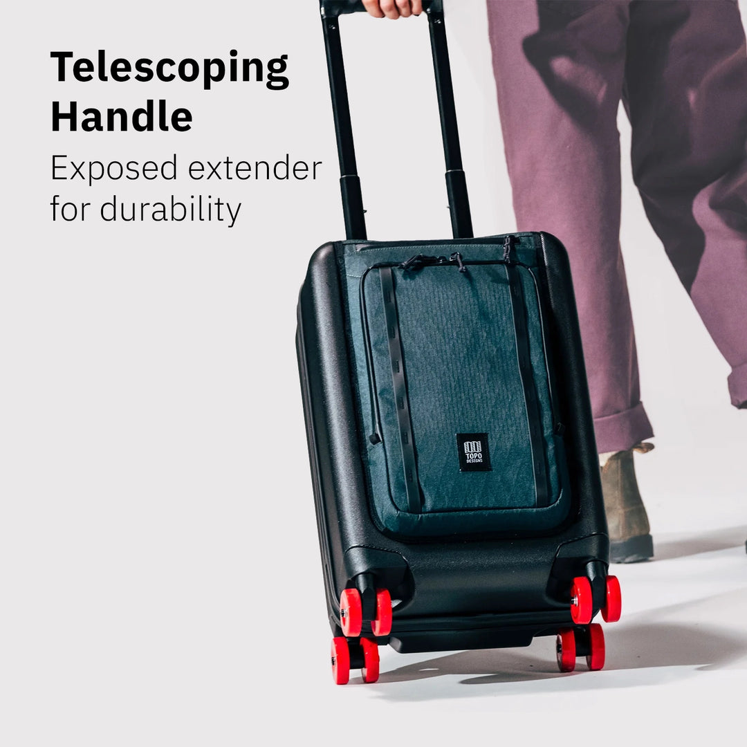Topo Designs Global Pro Travel Roller with exposed telescoping handle extended