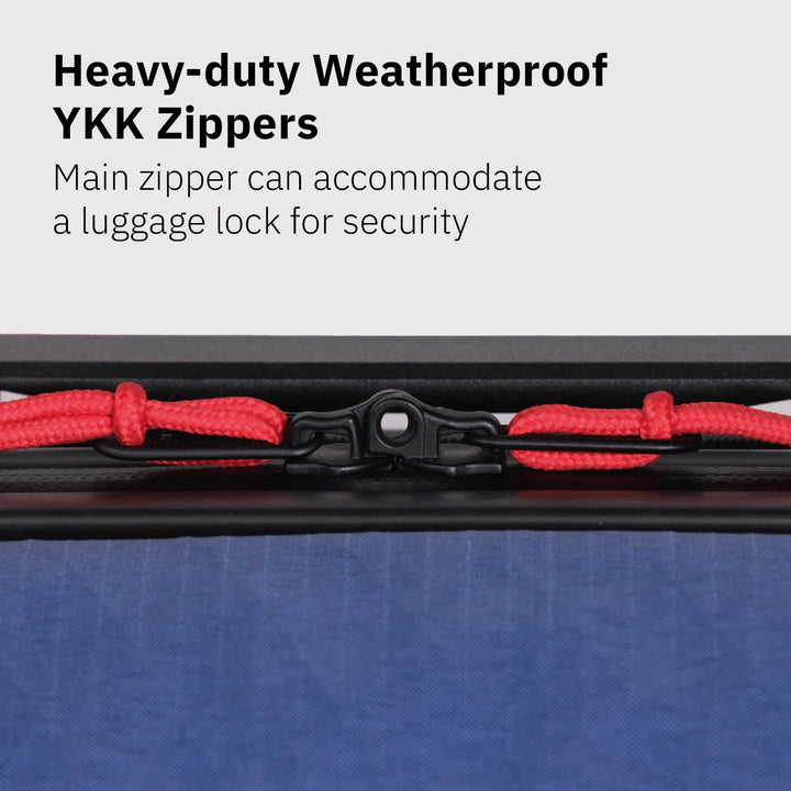 Close-up of Topo Designs Global Pro Travel Roller weatherproof zipper with luggage-lock compatible zipper pulls