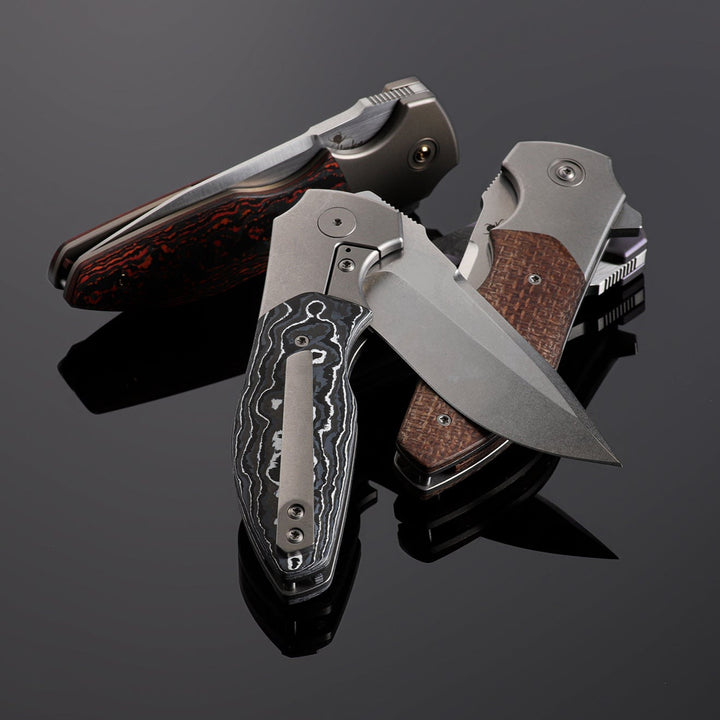 Kaviso x Kirby Raine Titanium Frame Lock Folding Knife with FatCarbon Bolsters and S35VN Blade Steel